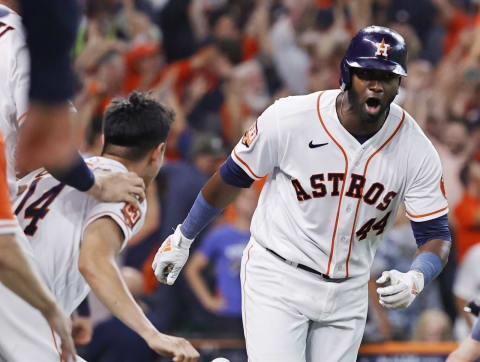 HOUSTON, TEXAS – OCTOBER 11: Yordan Alvarez #44 of the Houston Astros celebrates after hitting a walk-off home run against the Seattle Mariners during the ninth inning in game one of the American League Division Series at Minute Maid Park on October 11, 2022 in Houston, Texas. (Photo by Bob Levey/Getty Images)