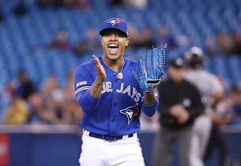 TORONTO, ON – MAY 11: Marcus Stroman #6 of the Toronto Blue Jays reacts after three quality defensive plays were made behind him in the field to end the first inning during MLB game action against the Chicago White Sox at Rogers Centre on May 11, 2019 in Toronto, Canada. (Photo by Tom Szczerbowski/Getty Images)