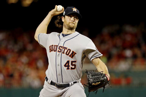 Oct 27, 2019; Washington, DC, USA; Houston Astros starting pitcher Gerrit Cole (45) pitches during the first inning against the Washington Nationals in game five of the 2019 World Series at Nationals Park. Mandatory Credit: Geoff Burke-USA TODAY Sports