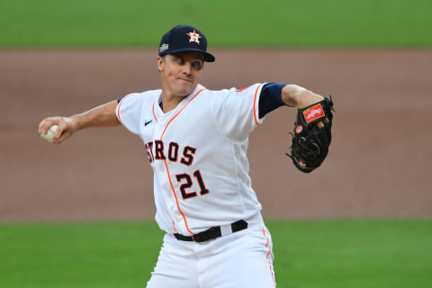 Oct 14, 2020; San Diego, California, USA; Houston Astros starting pitcher Zack Greinke (21) pitches in the first inning against the Tampa Bay Rays during game four of the 2020 ALCS at Petco Park. Mandatory Credit: Jayne Kamin-Oncea-USA TODAY Sports