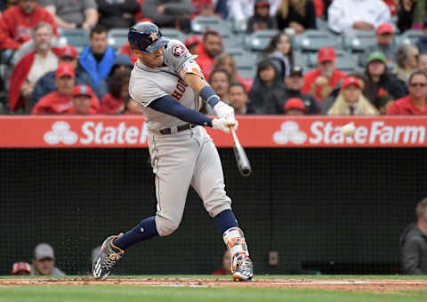 May 6, 2017; Anaheim, CA, USA; Houston Astros shortstop Carlos Correa (1) follows through on the double in the first inning against the Los Angeles Angels during an MLB baseball game at Angel Stadium of Anaheim. Mandatory Credit: Kirby Lee-USA TODAY Sports