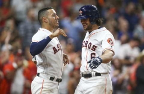 Jun 14, 2017; Houston, TX, USA; Houston Astros center fielder Jake Marisnick (6) celebrates with shortstop Carlos Correa (1) after hitting a home run during the sixth inning against the Texas Rangers at Minute Maid Park. Mandatory Credit: Troy Taormina-USA TODAY Sports