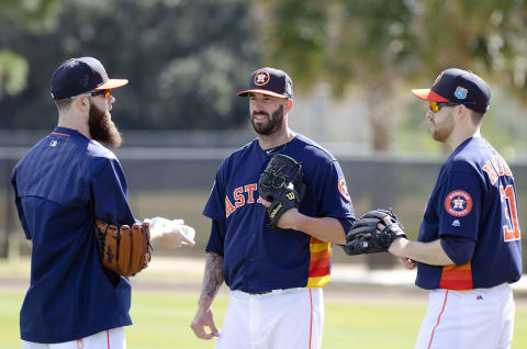 Feb 19, 2016; Kissimmee, FL, USA; Houston Astros pitcher Dallas Keuchel (left) talks with Mike Fiers (center) and pitcher Collin McHugh (31) during the workout at Osceola County Stadium. Mandatory Credit: Jonathan Dyer-USA TODAY Sports