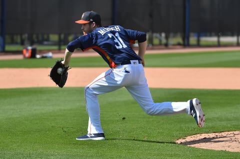 Feb 15, 2017; West Palm Beach, FL, USA; Houston Astros starting pitcher Collin McHugh (31) fields ground balls during spring training workouts at the Ballpark of the Palm Beaches. Mandatory Credit: Jasen Vinlove-USA TODAY Sports