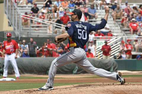 Mar 13, 2017; Jupiter, FL, USA; Houston Astros starting pitcher Charlie Morton (50) delivers a pitch against the St. Louis Cardinals during a spring training game at Roger Dean Stadium. The Cardinals defeated the Astros 6-3. Mandatory Credit: Scott Rovak-USA TODAY Sports