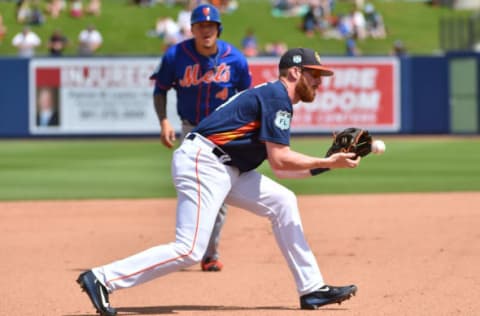 Mar 14, 2017; West Palm Beach, FL, USA; Houston Astros third baseman Colin Moran (19) fields a ground ball against the New York Mets during a spring training game at The Ballpark of the Palm Beaches. Mandatory Credit: Jasen Vinlove-USA TODAY Sports