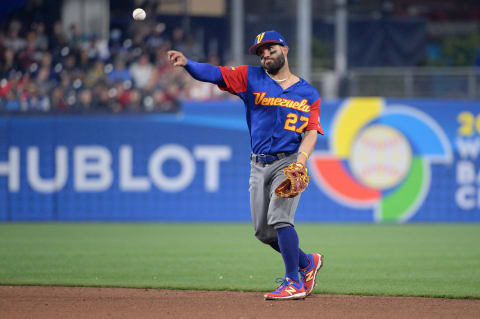 Mar 16, 2017; San Diego, CA, USA; Venezuela infielder Jose Altuve (27) throws to first base to force out Dominican Republic infielder Carlos Santana (not pictured) in the fourth inning during the 2017 World Baseball Classic at Petco Park. Mandatory Credit: Orlando Ramirez-USA TODAY Sports