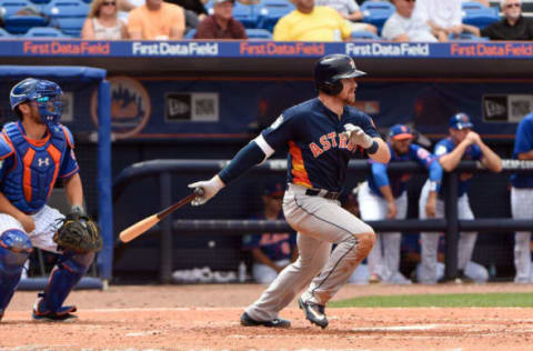 Mar 24, 2017; Port St. Lucie, FL, USA; Houston Astros center fielder Derek Fisher (77) connects for a base hit during a spring training game against the New York Mets at First Data Field. Mandatory Credit: Steve Mitchell-USA TODAY Sports