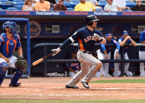 Mar 24, 2017; Port St. Lucie, FL, USA; Houston Astros center fielder Derek Fisher (77) connects for a base hit during a spring training game against the New York Mets at First Data Field. Mandatory Credit: Steve Mitchell-USA TODAY Sports