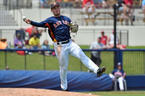 Mar 25, 2017; West Palm Beach, FL, USA; Houston Astros third baseman Alex Bregman (2) throws Washington Nationals shortstop Trea Turner (7) out at first base during a spring training game at The Ballpark of the Palm Beaches. Mandatory Credit: Jasen Vinlove-USA TODAY Sports