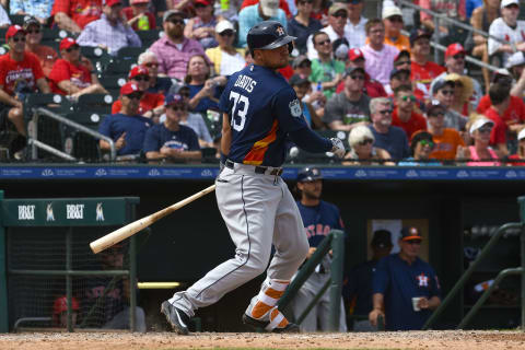 Mar 13, 2017; Jupiter, FL, USA; Houston Astros third baseman J.D. Davis (73) connects for a rbi base hit against the St. Louis Cardinals during a spring training game at Roger Dean Stadium. The Cardinals defeated the Astros 6-3. Mandatory Credit: Scott Rovak-USA TODAY Sports