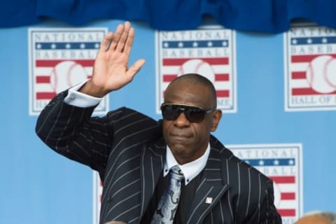 Hall of Fame player Andre Dawson responds to being introduced during the class of 2014 national baseball Hall of Fame induction ceremony at National Baseball Hall of Fame. Credit: Gregory J. Fisher-USA TODAY Sports