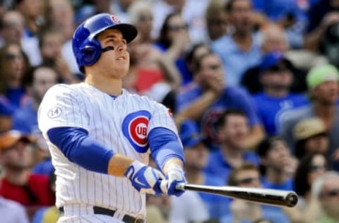 Sep 4, 2015; Chicago, IL, USA; Chicago Cubs first baseman Anthony Rizzo (44) watches his grand slam scoring Addison Russell, Austin Jackson and Chris Coghlan in the fifth inning against the Arizona Diamondbacks at Wrigley Field. Mandatory Credit: Matt Marton-USA TODAY Sports