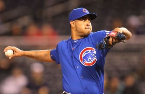 Apr 21, 2015; Pittsburgh, PA, USA; aChicago Cubs relief pitcher Hector Rondon (56) pitches against the Pittsburgh Pirates during the ninth inning at PNC Park. The Cubs won 9-8. Mandatory Credit: Charles LeClaire-USA TODAY Sports