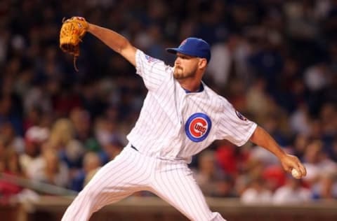 Jul 7, 2016; Chicago, IL, USA; Chicago Cubs relief pitcher Travis Wood (37) enters the game during the sixth inning against the Atlanta Braves at Wrigley Field. Mandatory Credit: Caylor Arnold-USA TODAY Sports