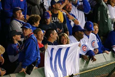 Oct 13, 2015; Chicago, IL, USA; Fans fly a w flag after the game four of the NLDS at Wrigley Field. Mandatory Credit: Dennis Wierzbicki-USA TODAY Sports