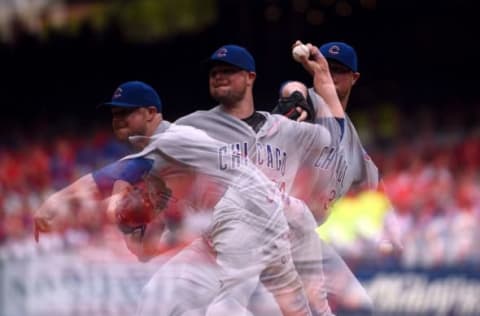 Sep 14, 2016; St. Louis, MO, USA; (Editors note: multiple exposure used to create this image) Chicago Cubs starting pitcher Jon Lester (34) pitches to a St. Louis Cardinals batter during the seventh inning at Busch Stadium. The Cubs won 7-0. Mandatory Credit: Jeff Curry-USA TODAY Sports