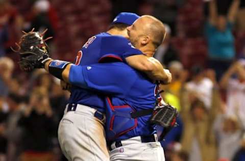 Apr 21, 2016; Cincinnati, OH, USA; Chicago Cubs starting pitcher Jake Arrieta (left) is congratulated by catcher David Ross (right) after Arrieta pitched a no-hitter against the Cincinnati Reds at Great American Ball Park. The Cubs won 16-0. Mandatory Credit: David Kohl-USA TODAY Sports