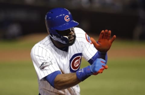 Oct 15, 2016; Chicago, IL, USA; Chicago Cubs right fielder Jason Heyward (22) reacts after hitting a triple against the Los Angeles Dodgers during the third inning of game one of the 2016 NLCS playoff baseball series at Wrigley Field. Mandatory Credit: Jon Durr-USA TODAY Sports