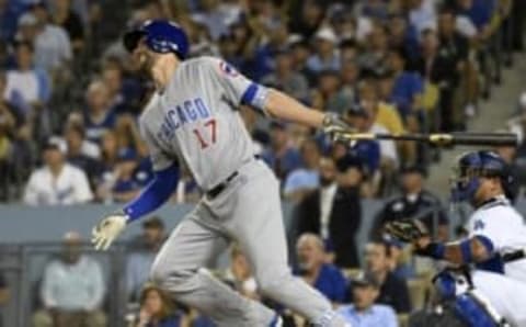 Oct 20, 2016; Los Angeles, CA, USA; Chicago Cubs third baseman Kris Bryant (17) doubles in the fifth inning against the Los Angeles Dodgers in game five of the 2016 NLCS playoff baseball series against the Los Angeles Dodgers at Dodger Stadium. Mandatory Credit: Richard Mackson-USA TODAY Sports