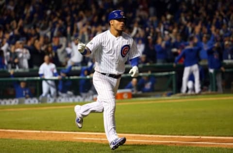 Oct 22, 2016; Chicago, IL, USA; Chicago Cubs catcher Willson Contreras (40) reacts after hitting a solo home run against the Los Angeles Dodgers during the fourth inning of game six of the 2016 NLCS playoff baseball series at Wrigley Field. Mandatory Credit: Jerry Lai-USA TODAY Sports