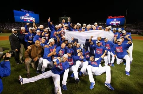 Oct 22, 2016; Chicago, IL, USA; The Chicago Cubs celebrate defeating the Los Angeles Dodgers in game six of the 2016 NLCS playoff baseball series at Wrigley Field. Cubs win 5-0 to advance to the World Series. Mandatory Credit: Jerry Lai-USA TODAY Sports