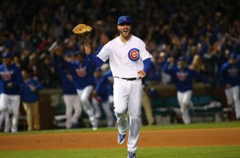 Oct 22, 2016; Chicago, IL, USA; Chicago Cubs third baseman Kris Bryant (17) celebrates defeating the Los Angeles Dodgers in game six of the 2016 NLCS playoff baseball series at Wrigley Field. Cubs win 5-0 to advance to the World Series. Mandatory Credit: Jerry Lai-USA TODAY Sports