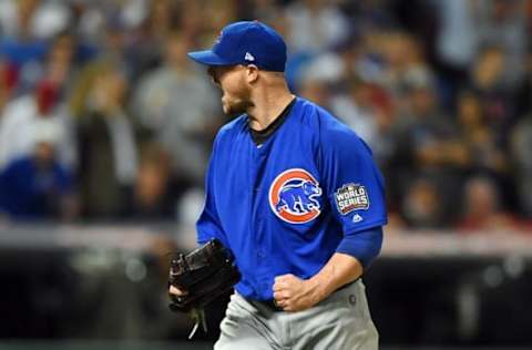 Nov 2, 2016; Cleveland, OH, USA; Chicago Cubs pitcher Jon Lester (34) reacts after retiring the Cleveland Indians in the 7th inning in game seven of the 2016 World Series at Progressive Field. Mandatory Credit: Tommy Gilligan-USA TODAY Sports