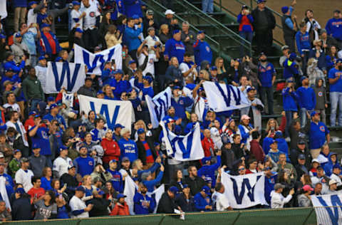 Chicago Cubs fans celebrate, Chicago Cubs (Photo by Andrew Weber/Getty Images)