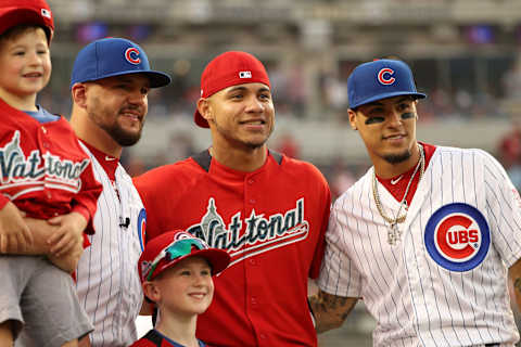 Kyle Schwarber, Willson Contreras, and Javier Baez. (Photo by Patrick Smith/Getty Images)