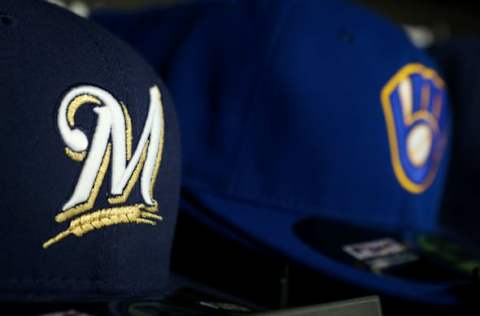 MILWAUKEE, WI – APRIL 24: Baseball hats with the current logo (L) and retro logo sit on display at Miller Park on April 24, 2016 in Milwaukee, Wisconsin. (Photo by Dylan Buell/Getty Images) *** Local Caption ***