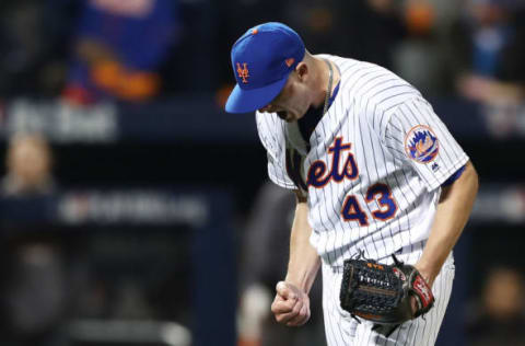 NEW YORK, NY – OCTOBER 05: Addison Reed #43 of the New York Mets reacts after striking out Hunter Pence #8 of the San Francisco Giants in the eighth inning during their National League Wild Card game at Citi Field on October 5, 2016 in New York City. (Photo by Elsa/Getty Images)