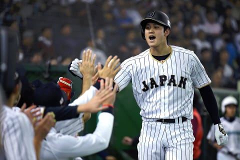 TOKYO, JAPAN – NOVEMBER 12: Shohei Ohtani #16 of Japan celebrates after hitting a solo homer in the fifth inning during the international friendly match between Japan and Netherlands at the Tokyo Dome on November 12, 2016 in Tokyo, Japan. (Photo by Masterpress/Getty Images)