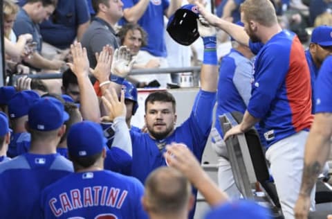 CHICAGO, IL – JULY 27: Kyle Schwarber (C) of the Chicago Cubs is greeted by his teammates after hitting a two-run homer against the Chicago White Sox during the fourth inning on July 27, 2017 at Guaranteed Rate Field in Chicago, Illinois. (Photo by David Banks/Getty Images)