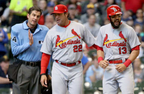 MILWAUKEE, WI – APRIL 23: Manager Mike Matheny and Matt Carpenter #13 of the St. Louis Cardinals confront umpire John Tumpane after Carpenter was ejected in the seventh inning against the Milwaukee Brewers at Miller Park on April 23, 2017 in Milwaukee, Wisconsin. (Photo by Dylan Buell/Getty Images)