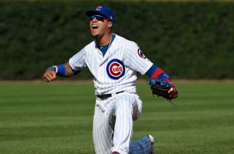 CHICAGO, IL – AUGUST 19: Javier Baez #9 of the Chicago Cubs reacts after throwing out Ryan Goins #17 of the Toronto Blue Jays at first base during the ninth inning on August 19, 2017 at Wrigley Field in Chicago, Illinois. The Cubs defeated the Blue Jays 4-3. (Photo by David Banks/Getty Images)