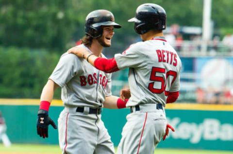 CLEVELAND, OH – AUGUST 21: Andrew Benintendi #16 celebrates with Mookie Betts #50 of the Boston Red Sox after both scored on Benintendi’s home run during the first inning against the Cleveland Indians at Progressive Field on August 21, 2017 in Cleveland, Ohio. (Photo by Jason Miller/Getty Images)