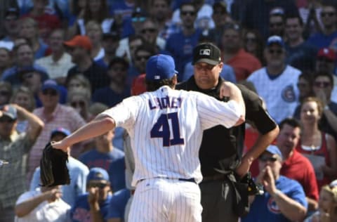 CHICAGO, IL – SEPTEMBER 15: John Lackey #41 of the Chicago Cubs argues a call with home plate umpire Jordan Baker #71 during the fifth inning of a game against the St. Louis Cardinals on September 15, 2017 at Wrigley Field in Chicago, Illinois. (Photo by David Banks/Getty Images)