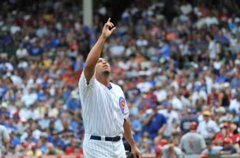 CHICAGO, IL – AUGUST 06: Starting pitcher Carlos Zambrano #38 of the Chicago Cubs points to the sky after finishing the sixth inning against the Cincinnati Reds at Wrigley Field on August 6, 2011 in Chicago, Illinois. (Photo by Brian Kersey/Getty Images)