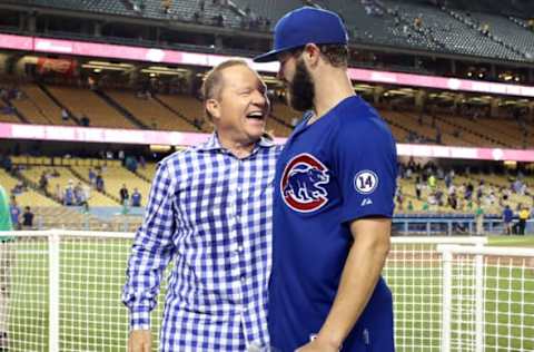 LOS ANGELES, CA – AUGUST 30: Starting pitcher Jake Arrieta #49 of the Chicago Cubsis greeted by agent Scott Boras after pitching a no hitter against the Los Angeles Dodgers at Dodger Stadium on August 30, 2015 in Los Angeles, California. The Cubs won 2-0. (Photo by Stephen Dunn/Getty Images)