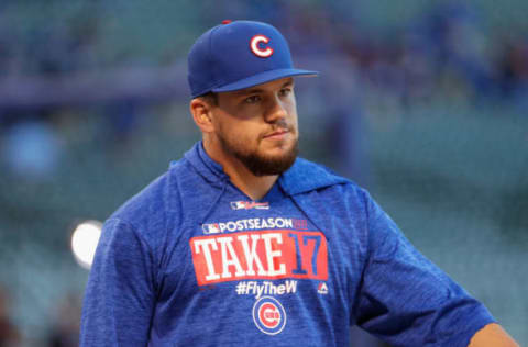 CHICAGO, IL – OCTOBER 17: Kyle Schwarber CHICAGO, IL – OCTOBER 17: Kyle Schwarber #12 of the Chicago Cubs looks on before game three of the National League Championship Series against the Los Angeles Dodgers at Wrigley Field on October 17, 2017 in Chicago, Illinois. (Photo by Jamie Squire/Getty Images)