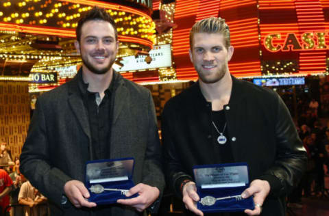 LAS VEGAS, NV – DECEMBER 17: Chicago Cubs third baseman and Major League Baseball 2015 National League Rookie of the Year Kris Bryant (L) and Washington Nationals right fielder and MLB 2015 National League Most Valuable Player Bryce Harper hold ceremonial keys to the city of Las Vegas they received from Las Vegas Mayor Carolyn Goodman at the Fremont Street Experience on December 17, 2015 in Las Vegas, Nevada. Both players grew up playing against and with each other in Las Vegas. (Photo by Ethan Miller/Getty Images)