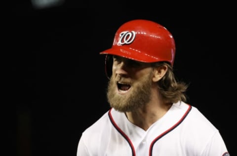 WASHINGTON, DC – OCTOBER 12: Bryce Harper #34 of the Washington Nationals reacts after hitting a sacrifice fly against the Chicago Cubs during the seventh inning in game five of the National League Division Series at Nationals Park on October 12, 2017 in Washington, DC. (Photo by Patrick Smith/Getty Images)