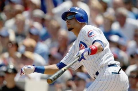 CHICAGO – JULY 26: Aramis Ramirez #16 of the Chicago Cubs follows his hit during the game against the Florida Marlins on July 26, 2008 at Wrigley Field in Chicago, Illinois. The Marlins defeated the Cubs 3-2 in 12 innings. (Photo by Jonathan Daniel/Getty Images)