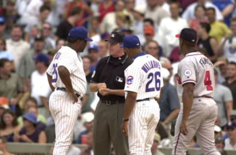 07 Sep 2001: Manager Don Baylor #25 and coach Billy Williams #26 address an umpire during the game against the Atlanta Braves at Wrigley Field in Chicago, Illinois. The Braves won 3-2. DIGITAL IMAGE. Mandatory Credit: Jonathan Daniel/Allsport