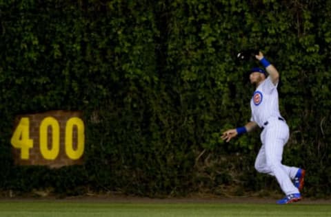 May 17, 2017; Chicago, IL, USA; Chicago Cubs center fielder Ian Happ (8) catches a fly ball hit by Cincinnati Reds catcher Tucker Barnhart (16) in the sixth inning at Wrigley Field. Mandatory Credit: Matt Marton-USA TODAY Sports