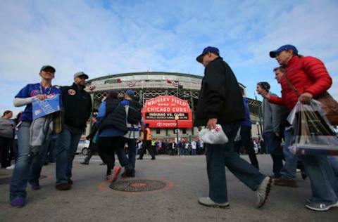 Oct 30, 2016; Chicago, IL, USA; Fans walk in front of Wrigley Field before game five of the 2016 World Series between the Chicago Cubs and the Cleveland Indians. Mandatory Credit: Jerry Lai-USA TODAY Sports