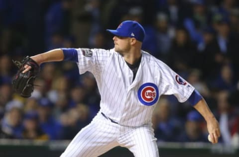 Oct 30, 2016; Chicago, IL, USA; Chicago Cubs starting pitcher Jon Lester (34) delivers a pitch against the Cleveland Indians during the first inning in game five of the 2016 World Series at Wrigley Field. Mandatory Credit: Dennis Wierzbicki-USA TODAY Sports