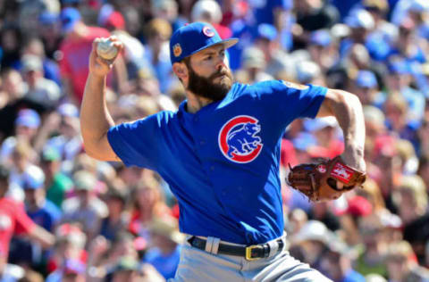 Mar 6, 2017; Tempe, AZ, USA; Chicago Cubs starting pitcher Jake Arrieta (49) throws in the first inning against the Los Angeles Angels during a spring training game at Tempe Diablo Stadium. Mandatory Credit: Matt Kartozian-USA TODAY Sports