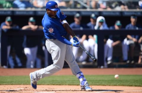 Mar 10, 2017; Peoria, AZ, USA; Chicago Cubs right fielder Eloy Jimenez (68) hits a pitch against the Seattle Mariners during the second inning at Peoria Stadium. Mandatory Credit: Joe Camporeale-USA TODAY Sports